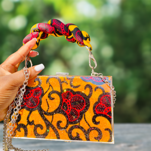 African fabric handbags with bold Ankara prints, Stylish Adire fabric tote bags for everyday use, Aso oke clutch purses, Ankara handbags, Ankara bags, African-inspired handbags, Waterproof Ankara bags, Ankara print handbags, Handmade fabric bags, how to make Ankara bags, African-inspired Adire fabric shoulder bags, 2024 ankara backpacks, Fashionable Ankara fabric bags and earrings, Ankara purse, Ankara clutch, waterproof Ankara clutch, African shape bags, 2024 Ankara bags, 2024 Ankara fashion accessories, afrocentric accessories, fashion accessories, Africa fashion accessories, Nigerian fashion industry, Ankara bags for women, Ankara bags on Amazon, African products on Amazon, DunsinCrafts, DunsinCraft Collection, Oluwadunsin Bolaji, Africa map crossbody bag