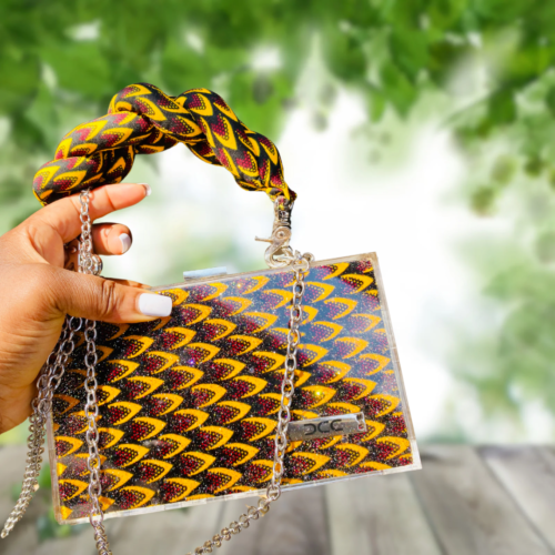 African fabric handbags with bold Ankara prints, Stylish Adire fabric tote bags for everyday use, Aso oke clutch purses, Ankara handbags, Ankara bags, African-inspired handbags, Waterproof Ankara bags, Ankara print handbags, Handmade fabric bags, how to make Ankara bags, African-inspired Adire fabric shoulder bags, 2024 ankara backpacks, Fashionable Ankara fabric bags and earrings, Ankara purse, Ankara clutch, waterproof Ankara clutch, African shape bags, 2024 Ankara bags, 2024 Ankara fashion accessories, afrocentric accessories, fashion accessories, Africa fashion accessories, Nigerian fashion industry, Ankara bags for women, Ankara bags on Amazon, African products on Amazon, DunsinCrafts, DunsinCraft Collection, Oluwadunsin Bolaji, Africa map crossbody bag