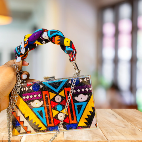 African fabric handbags with bold Ankara prints, Stylish Adire fabric tote bags for everyday use, Aso oke clutch purses, Ankara handbags, Ankara bags, African-inspired handbags, Waterproof Ankara bags, Ankara print handbags, Handmade fabric bags, how to make Ankara bags, African-inspired Adire fabric shoulder bags, 2024 ankara backpacks, Fashionable Ankara fabric bags and earrings, Ankara purse, Ankara clutch, waterproof Ankara clutch, African shape bags, 2024 Ankara bags, 2024 Ankara fashion accessories, afrocentric accessories, fashion accessories, Africa fashion accessories, Nigerian fashion industry, Ankara bags for women, Ankara bags on Amazon, African products on Amazon, DunsinCrafts, DunsinCraft Collection, Oluwadunsin Bolaji, Africa map crossbody bag