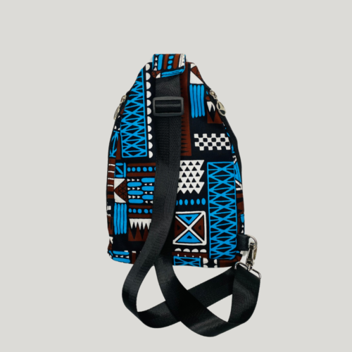 African fabric backpack with bold Ankara prints, Stylish Ankara crossbody bags for everyday use, leather crossbody bags, Ankara handbags, Ankara bags, African-inspired handbags, Ankara crossbody bags, Ankara print handbags, Handmade fabric bags, how to make Ankara bags, African-inspired Adire fabric shoulder bags, 2024 ankara backpacks, Fashionable Ankara fabric bags and earrings, unisex crossbody bag, African shape bags, 2024 Ankara bags, 2024 Ankara fashion accessories, afrocentric accessories, fashion accessories, Africa fashion accessories, Nigerian fashion industry, Ankara bags for women, Ankara bags on Amazon, African products on Amazon, DunsinCrafts, DunsinCraft Collection, Ankara shoulder bag, Ankara crossbody bags for men, Ankara crossbody bags for women, Ankara crossbody bag design 2024, luxury crossbody bags