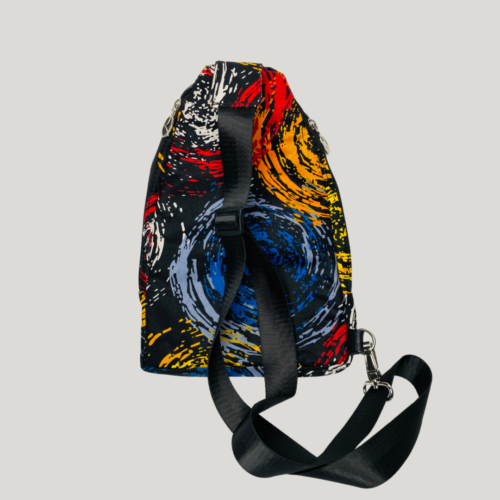 African fabric backpack with bold Ankara prints, Stylish Ankara crossbody bags for everyday use, leather crossbody bags, Ankara handbags, Ankara bags, African-inspired handbags, Ankara crossbody bags, Ankara print handbags, Handmade fabric bags, how to make Ankara bags, African-inspired Adire fabric shoulder bags, 2024 ankara backpacks, Fashionable Ankara fabric bags and earrings, unisex crossbody bag, African shape bags, 2024 Ankara bags, 2024 Ankara fashion accessories, afrocentric accessories, fashion accessories, Africa fashion accessories, Nigerian fashion industry, Ankara bags for women, Ankara bags on Amazon, African products on Amazon, DunsinCrafts, DunsinCraft Collection, Ankara shoulder bag, Ankara crossbody bags for men, Ankara crossbody bags for women, Ankara crossbody bag design 2024, luxury crossbody bags