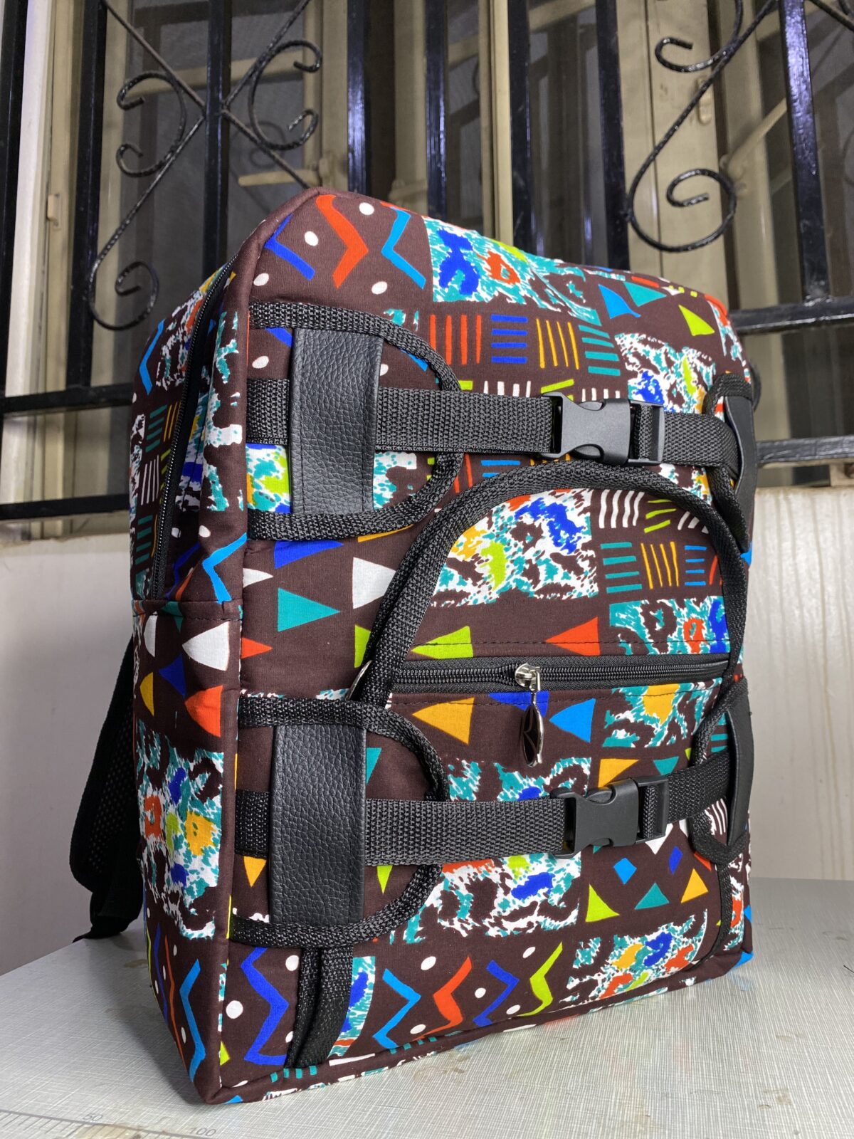 African fabric backpack with bold Ankara prints, Stylish Ankara drawstring bags for everyday use, leather drawstring bags, Ankara drawstring, Ankara bags, African-inspired drawstring bags, Ankara tote bags, Ankara print handbags, Handmade fabric totebags, how to make Ankara bags, African-inspired Adire fabric drawstring bags, 2024 ankara backpacks, Fashionable Ankara fabric tote bag, unisex drawstring bag, African tote bags, 2024 Ankara bags, 2024 Ankara fashion accessories, afrocentric accessories, fashion accessories, Africa fashion accessories, Nigerian fashion industry, Ankara bags for women, Ankara bags on Amazon, African products on Amazon, DunsinCrafts, DunsinCraft Collection, Ankara shoulder bag, Ankara drawstring bags for men, Ankara tote bags for women, Ankara tote bag design 2024, luxury tote bags, drawstring bags in Nigeria, Tote bags in Nigeria