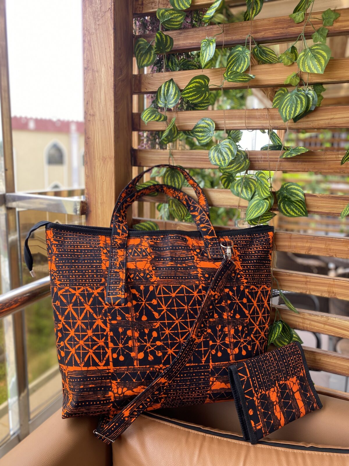 African fabric handbags with bold Ankara prints, Stylish Adire fabric tote bags for everyday use, Ankara handbags, Ankara bags, African-inspired handbags, Ankara print handbags, Handmade fabric bags, how to make Ankara bags, African-inspired Adire fabric shoulder bags, Fashionable Ankara fabric bags and earrings, Ankara purse, 2024 Ankara bags, 2024 Ankara fashion accessories, afrocentric accessories, fashion accessories, Africa fashion accessories, Nigerian fashion industry, Ankara bags for women, Ankara bags on Amazon, African products on Amazon, DunsinCrafts, DunsinCraft Collection, Handmade fabric totebags, how to make Ankara tote bags, African tote bags, Tote bags in Nigeria, Tote bags in Lagos, Ankara tote bags for women, Ankara tote bag design 2024, Ankara tote bags for beaches, Ankara beach totebag